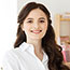 Portrait cliente satisfaite après prestation de nettoyage